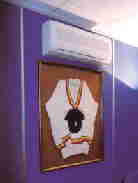 Split system air conditioning unit